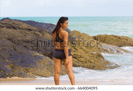 lady on the beach to swimming