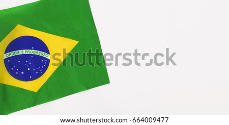 Brazilian waving flag isolated on white background. Concept Image. 