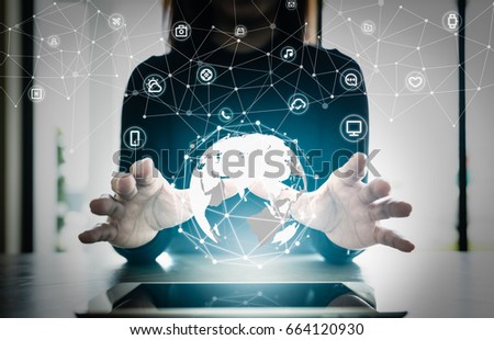 Close up hand's woman over digital planet global connection with communication network application icon,  internet of things (IoT) and Digital era. Marketing 4.0 Royalty-Free Stock Photo #664120930
