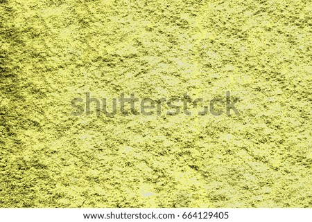 Yellow gold background created from picture of sand stone surface.

