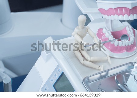 Dentistry, medical equipment  of dental  instruments, Dental instruments, dental equipment, in the dental clinic. Have mannequin figures in picture.