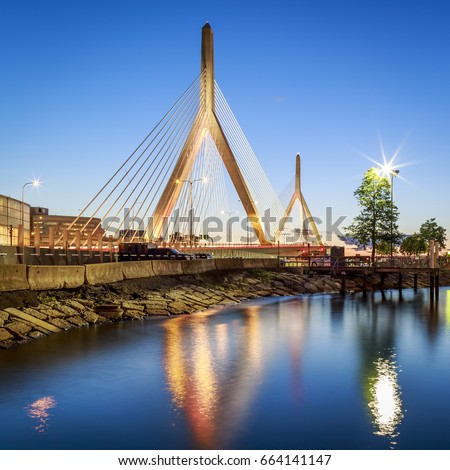 The architecture of the Famous Zakim Bridge in Boston, Massachusetts, USA at sunset.