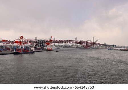 View of the bridge, the port terminal and the city of Osaka from the strait.