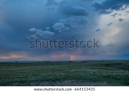 Rainbow thunderstorm in The Colorado Grasslands