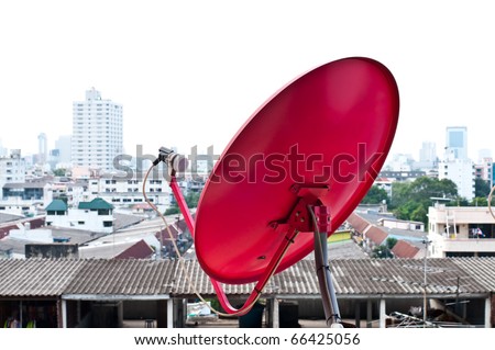 Red satellite dish on roof, Thailand.
