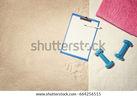 Top view photograph of sandy beach. Frame composition. Vintage effect background with copy space. Frame for advertising or concepts