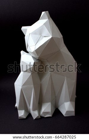 3d white paper cat with kitten  on black background. full size, vertical. Origami toy. Origami cats. 