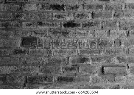 Grey background created from picture of red brick wall.

