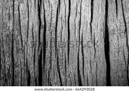 Grey background created from picture of wooden plank surface.

