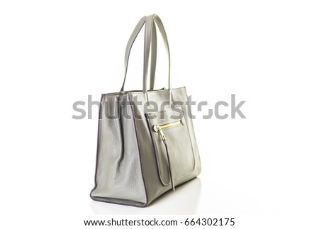 Fashinable womens leather tote bag from gray leather on a white isolated background.