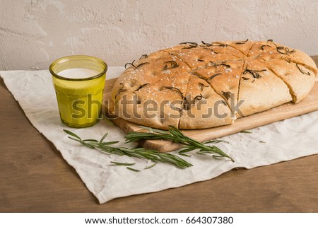 Italian bread - focaccia with milk on breakfast morning. Horizontal food photo recipe.