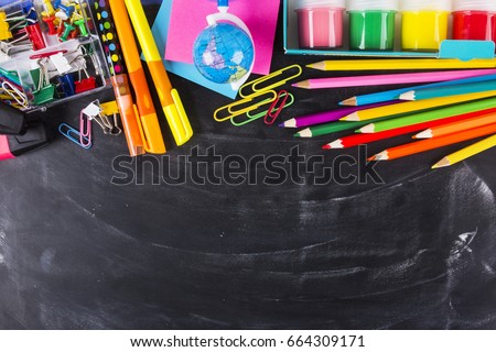 Blackboard and school supplies 