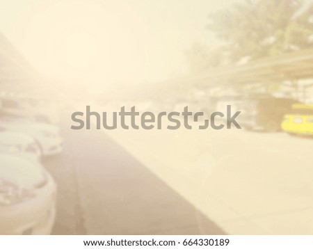 Abstract blur cars parking with bokeh light Background