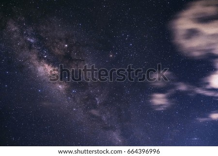 Milky way galaxy with cloudy sky
