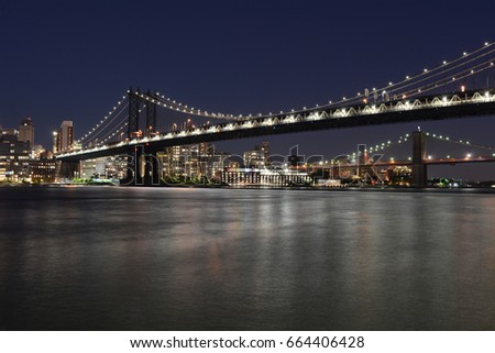 Manhattan Bridge With Brooklyn Bridge In the Background at Night