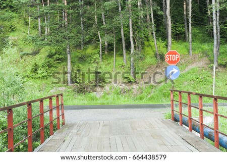 rural entrance to road with stop sign     