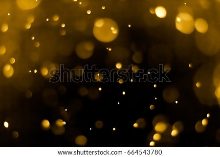 abstract bokeh background dark yellow color