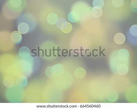 Yellow blue pink green bokeh on dark background