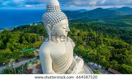 aerial photography white great Phuket's big Buddha in blue sky. Phuket's Big Buddha is one of the island's most important and revered landmarks on the island.