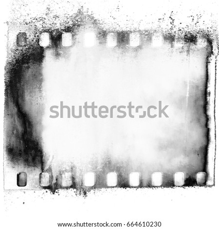 Black and white grunge film strip frame on dripping background.