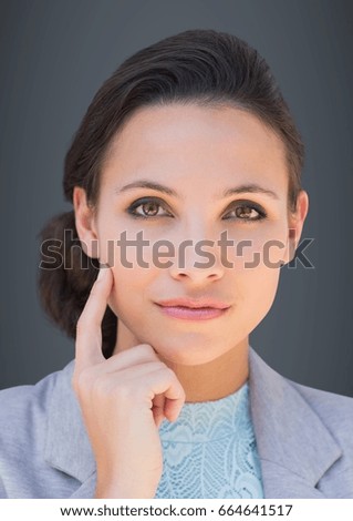 Digital composite of Close up of business woman thinking against grey background