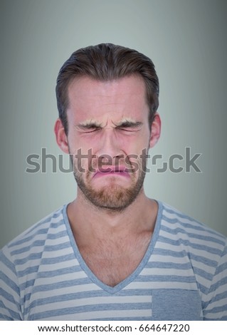 Digital composite of Man crying against light blue background