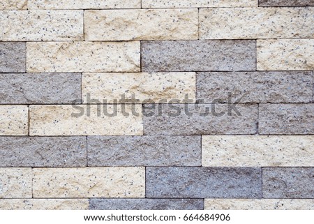 The pattern of the surface of the marble walls.