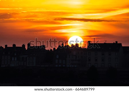 Beautiful Sunset Over the City of Granville, France. Urban scene, city life.