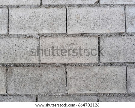 Closeup cement brick wall background.