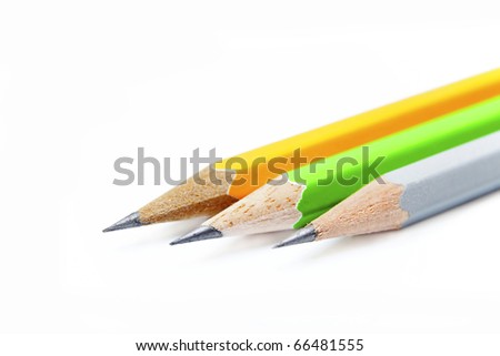 Three isolated co-lour pencils on a white background