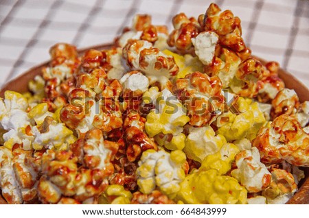 close up of colorful popcorn of caramel and banana flavor