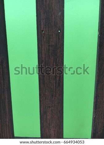 Wood and green walls.