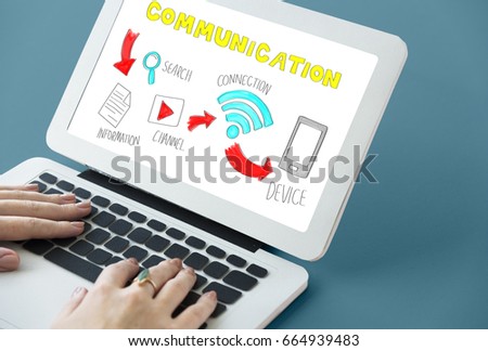 Hands working on laptop network graphic overlay