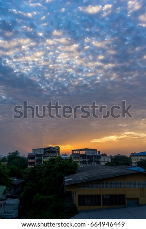 Good morning great sunrise on blue sky golden hour smooth alto-cumulus clouds