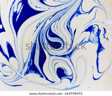 Marbled blue and white abstract background. Liquid marble pattern. Royalty-Free Stock Photo #664948492