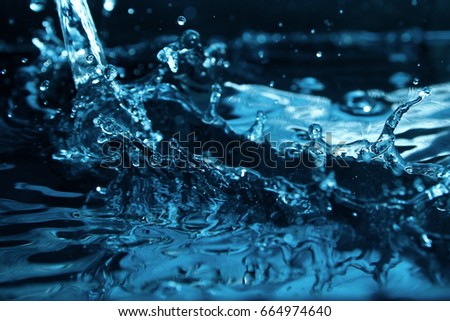 Water splash background / Water is a transparent and nearly colorless chemical substance that is the main constituent of Earth's streams, lakes, and oceans, and the fluids of most living