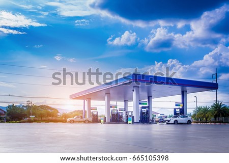 Gas fuel station with clouds and blue sky Royalty-Free Stock Photo #665105398