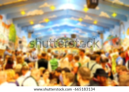 Blur_People enjoy live music and drinking beer during October festival in munich (München), Germany Royalty-Free Stock Photo #665183134