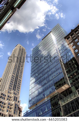 Aspirations in the corporate world represented in gleaming steel and glass, reach for the sky - 6