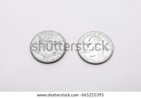 Closeup to Tennessee State Symbol on Quarter Dollar Coin on White Background