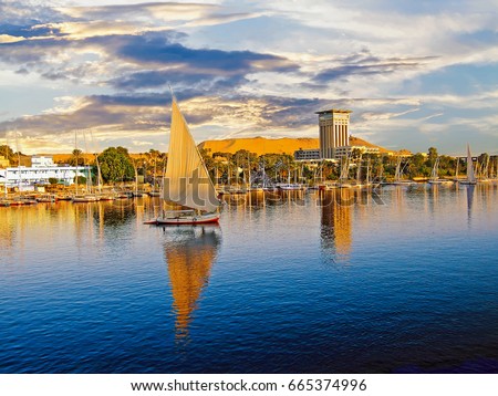 Luxor on The River Nile is a popular place for tourist boats to moor prior to crusing the river nile, Egypt, 2008 Royalty-Free Stock Photo #665374996
