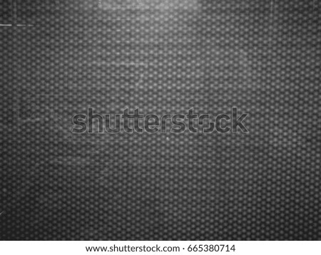 pattern consisting of squares on a grey background.Soft focus