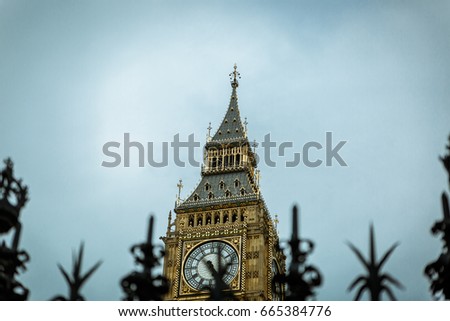 Great view of the high part of Big Ben tower on a dark day, United Kingdom