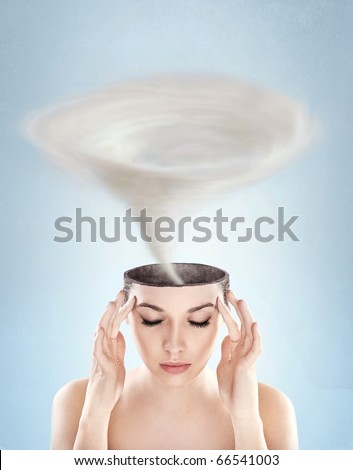 Conceptual picture - tornado in woman's head