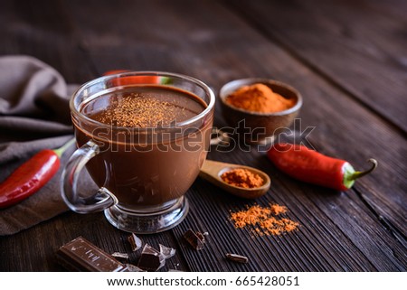 Cup of hot chocolate flavored with chili pepper