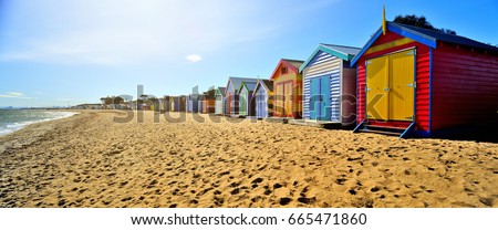 Brighton Beach Boxes in hot sunny day Royalty-Free Stock Photo #665471860