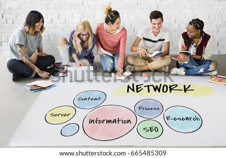 Students working on billboard network graphic overlay on floor