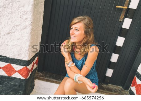 Fashionable attractive cute girl enjoying outdoors.