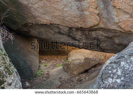 Small cave in natural area of the Barruecos. Extremadura. Spain.