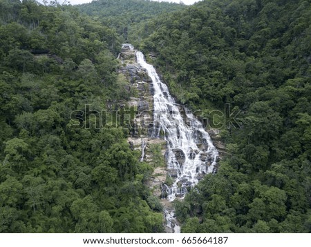 Beautiful waterfall in tropical rainforest, Southeast Asia.